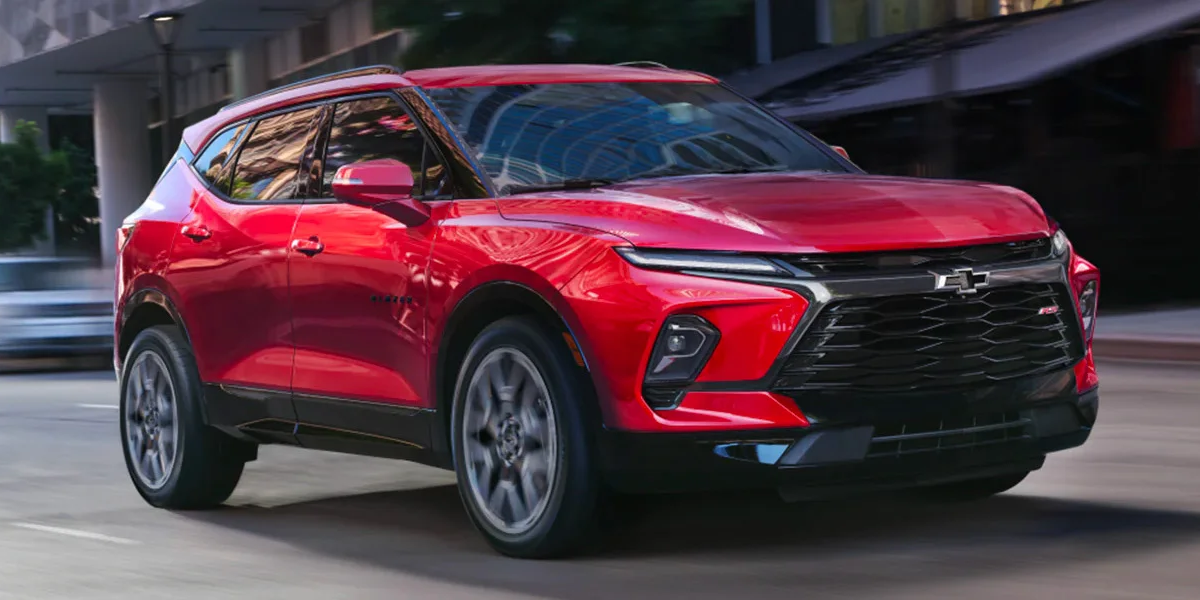 The 2023 Chevy Blazer driving on a road.