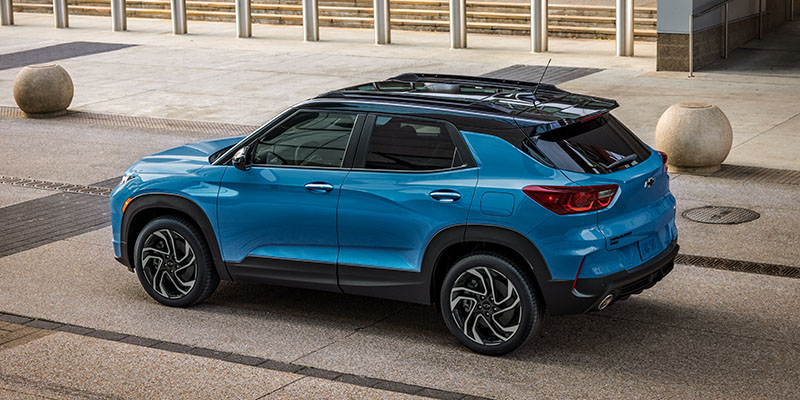 A blue Chevrolet Trailblazer parked in an urban environment.